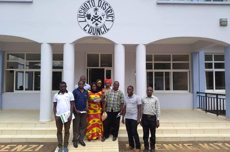 People standing in front of Lushoto District Council building