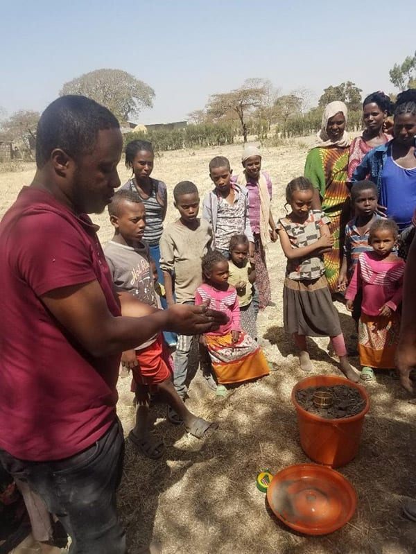 Mr. Adane Buni near Arsi Negele collecting soil samples to be used during trainings in Ethiopia.