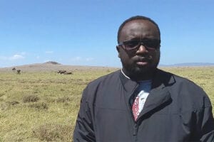 David Kimiti with rhinos